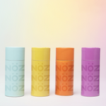 Load image into Gallery viewer, Front view of Neon blue, yellow, orange, purple NOZ sunscreen sticks
