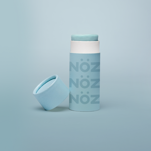 Front view of Neon blue  NOZ sunscreen stick with lid off 